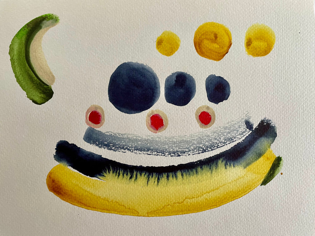 Artistic depiction of a face made from fruit and vegetables on a plain background